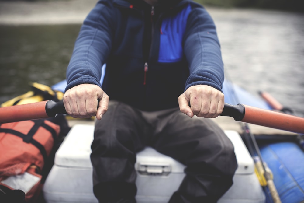 man rowing boat