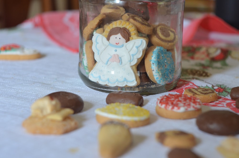 assorted pastries beside glass jar