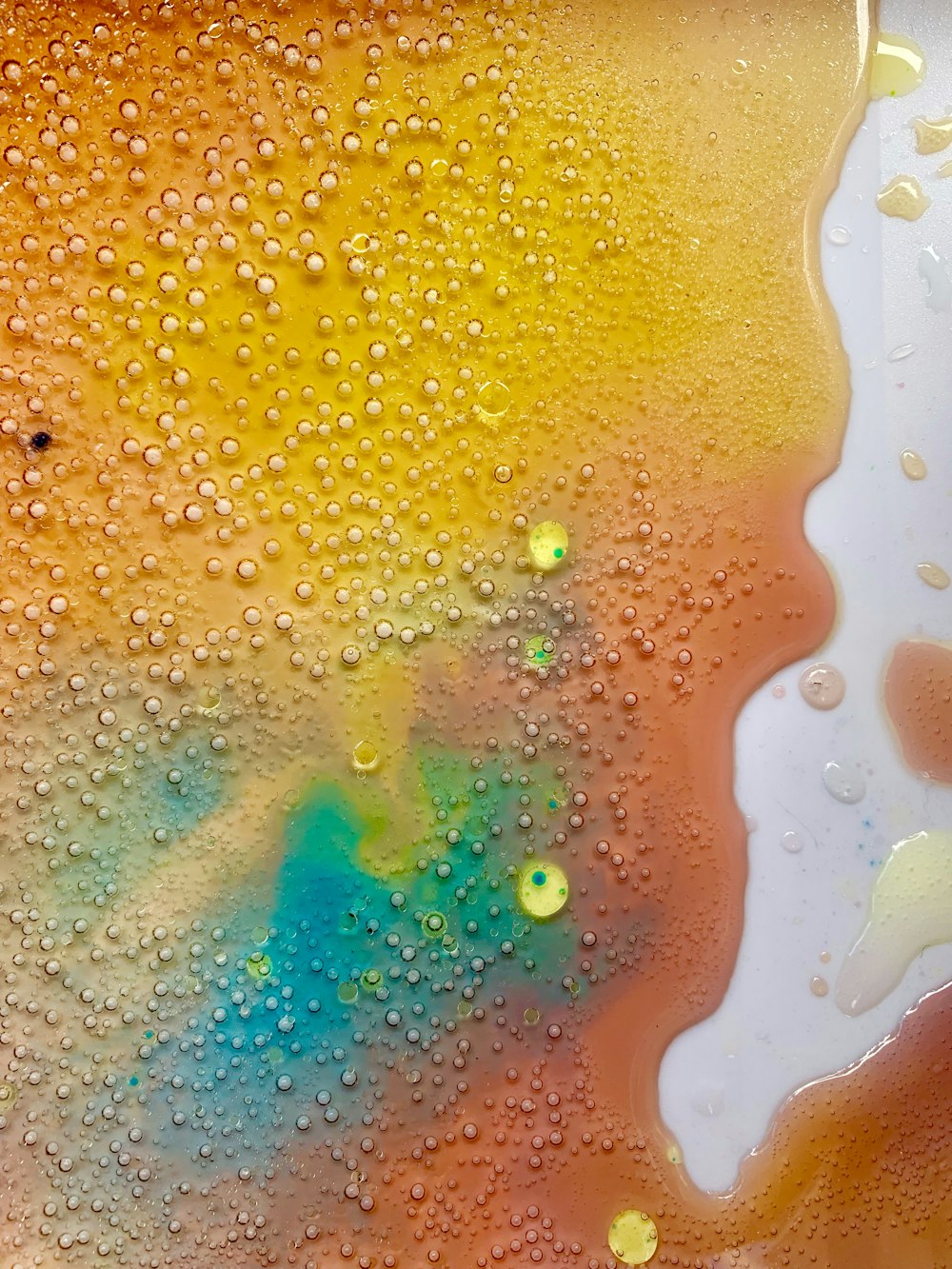 multicolored spilled liquid