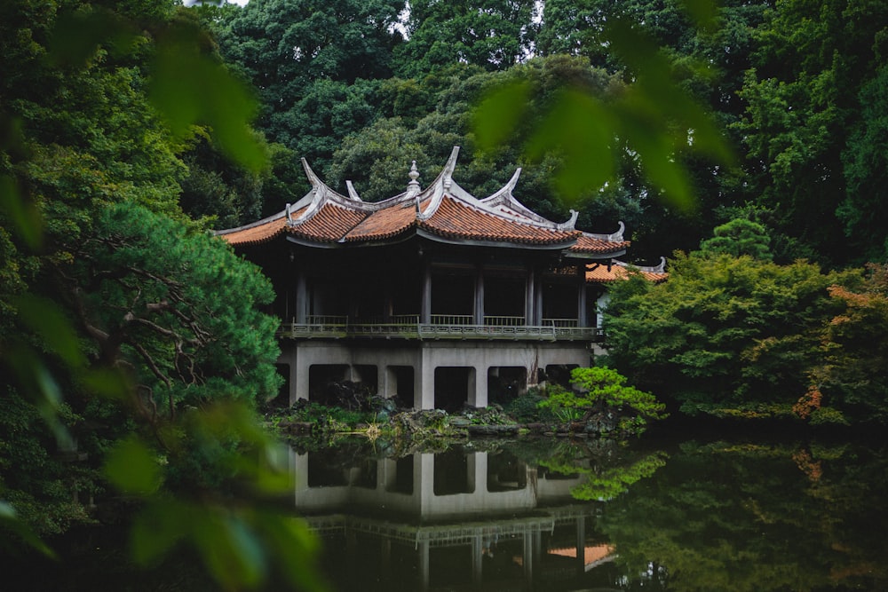 white temple near green trees