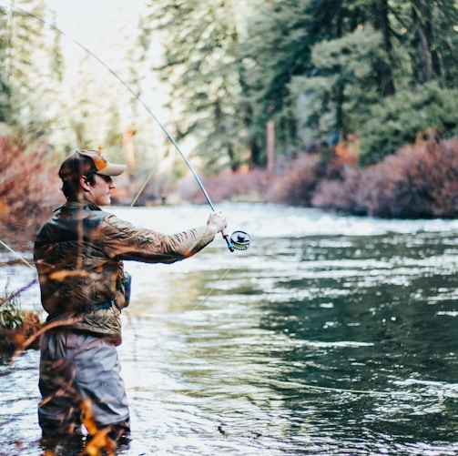 man fishing during daytime