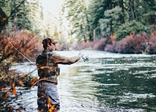 man fishing during daytime