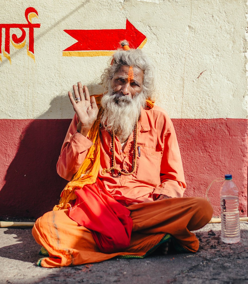 man sitting on flooor