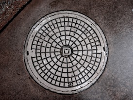 gray manhole cover