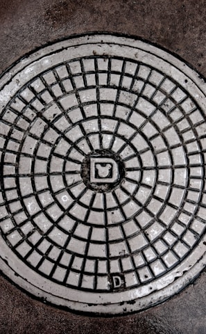 gray manhole cover