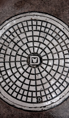 gray manhole cover