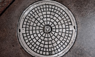 gray manhole cover