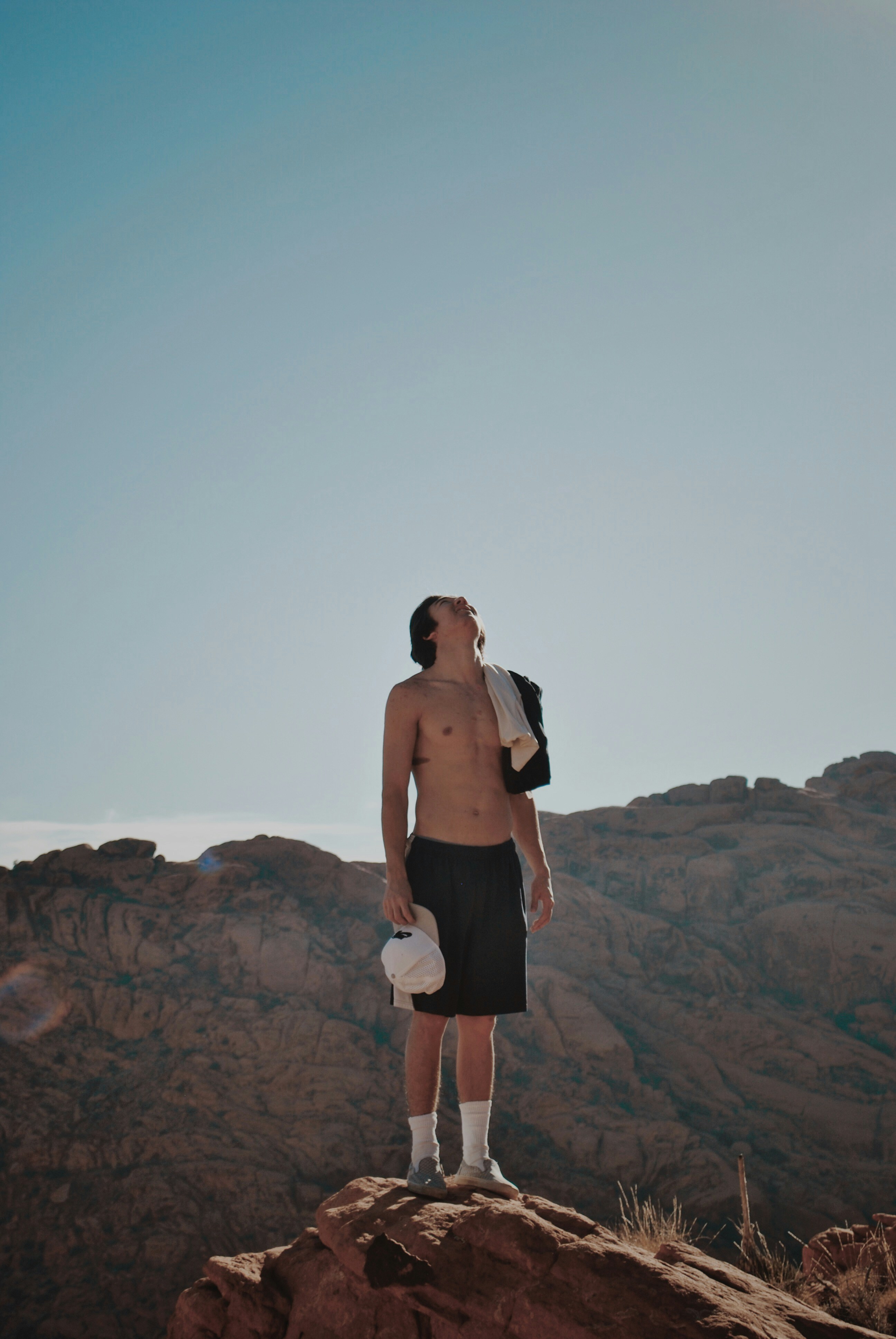 man standing on rock