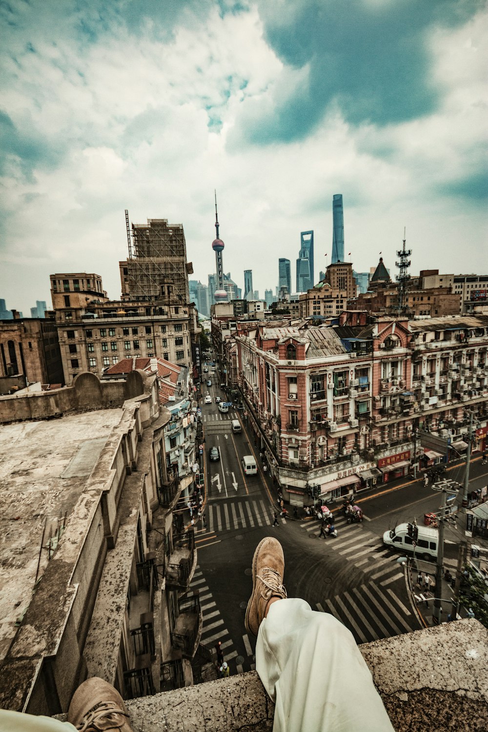 person watching buildings at daytime