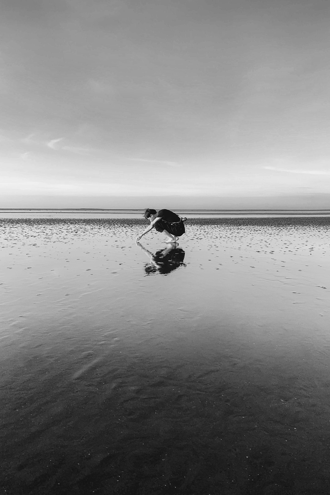 person holding beach sand