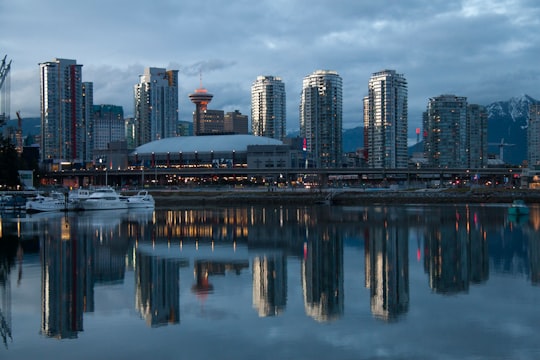 body of water and buildings in Tap & Barrel • Olympic Village Canada