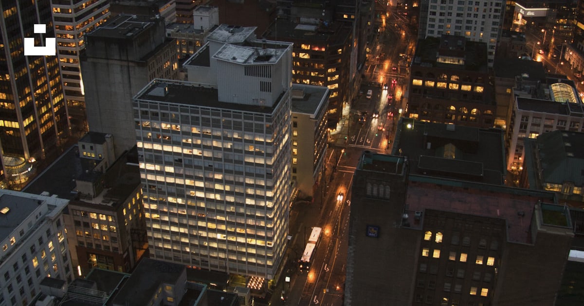 Lighted high-rise buildings at night photo – Free City Image on Unsplash