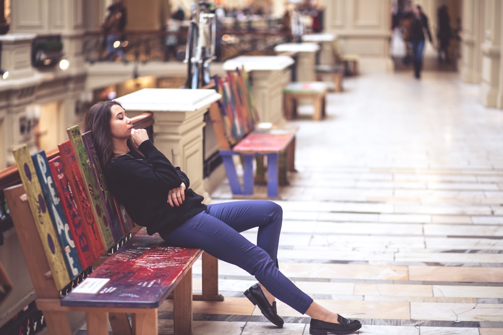 woman sitting on bench