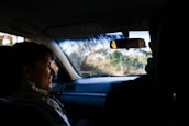 A happy passenger enjoying the ride in a Brazilian city.