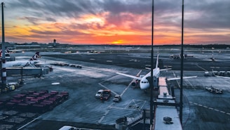 a large jetliner sitting on top of an airport tarmac