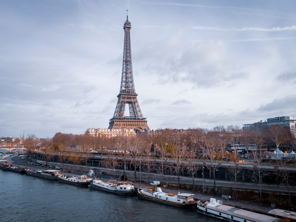 eiffel tower near body of water during daytime