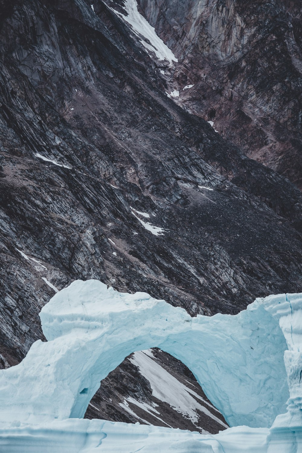 snow covered arc and mountain