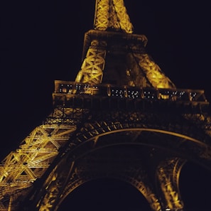 Night view of illuminated metal construction highlighting design precision