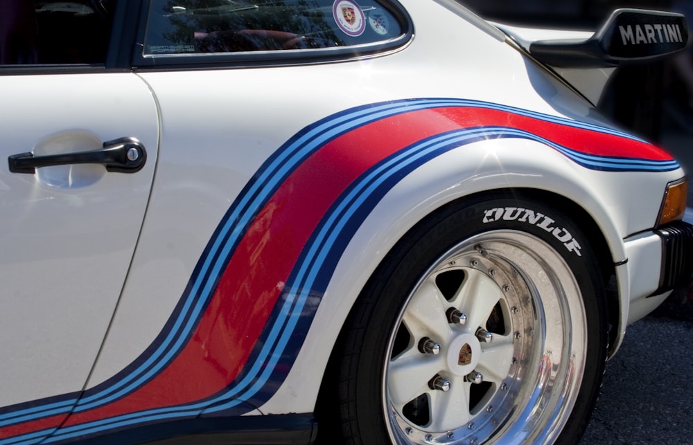 Sports car with martini vinyl during daytime