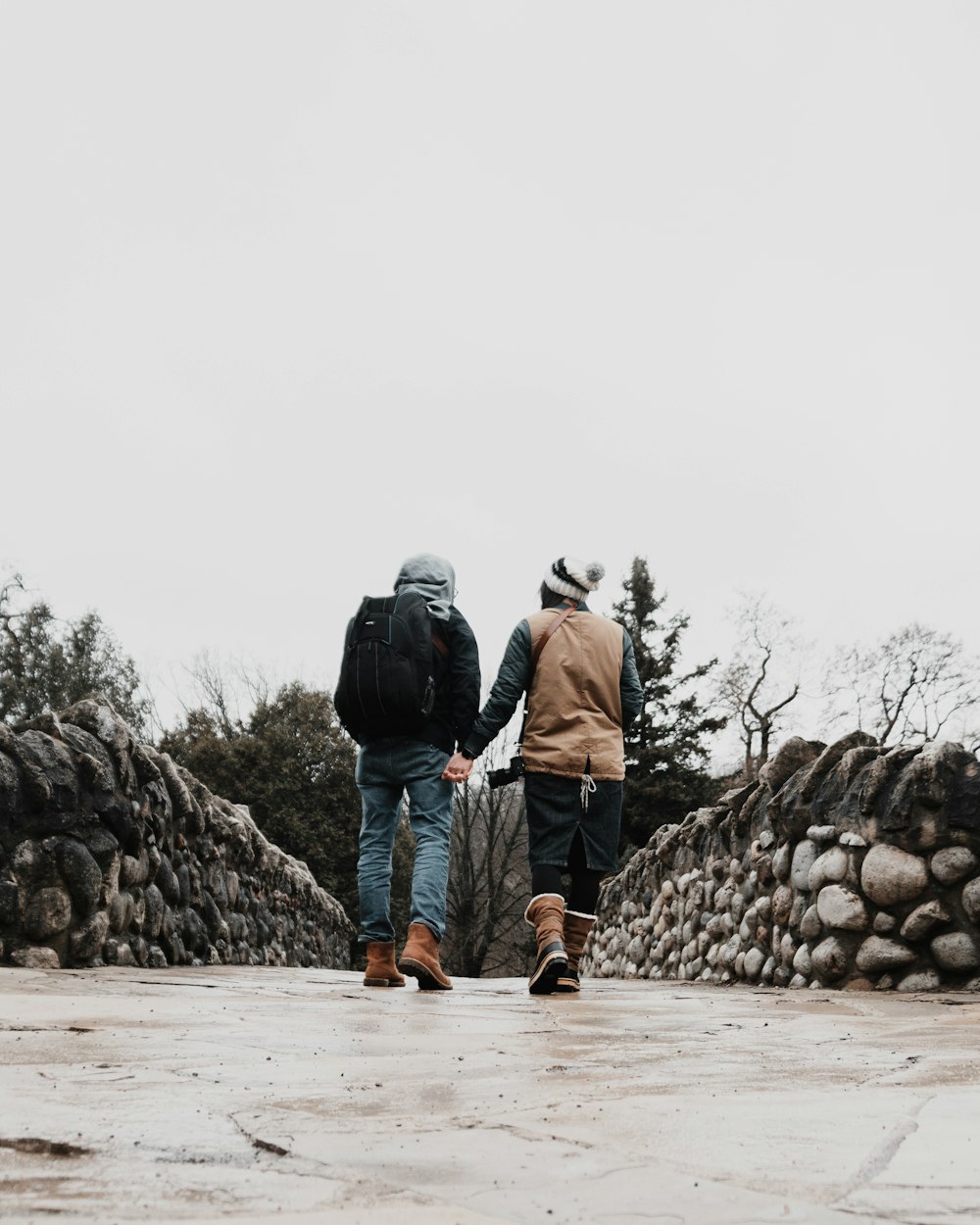 two people walking during daytime