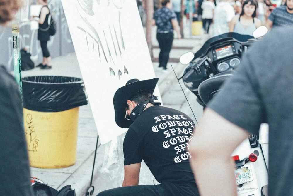 man painting on street