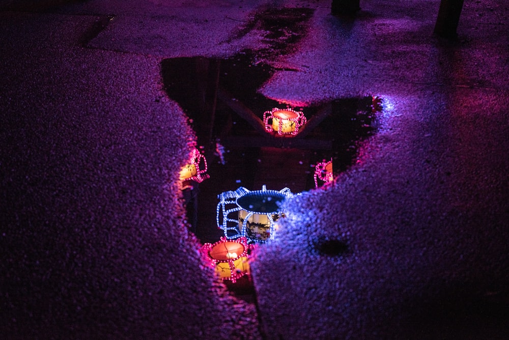 decorative lights reflection on puddle
