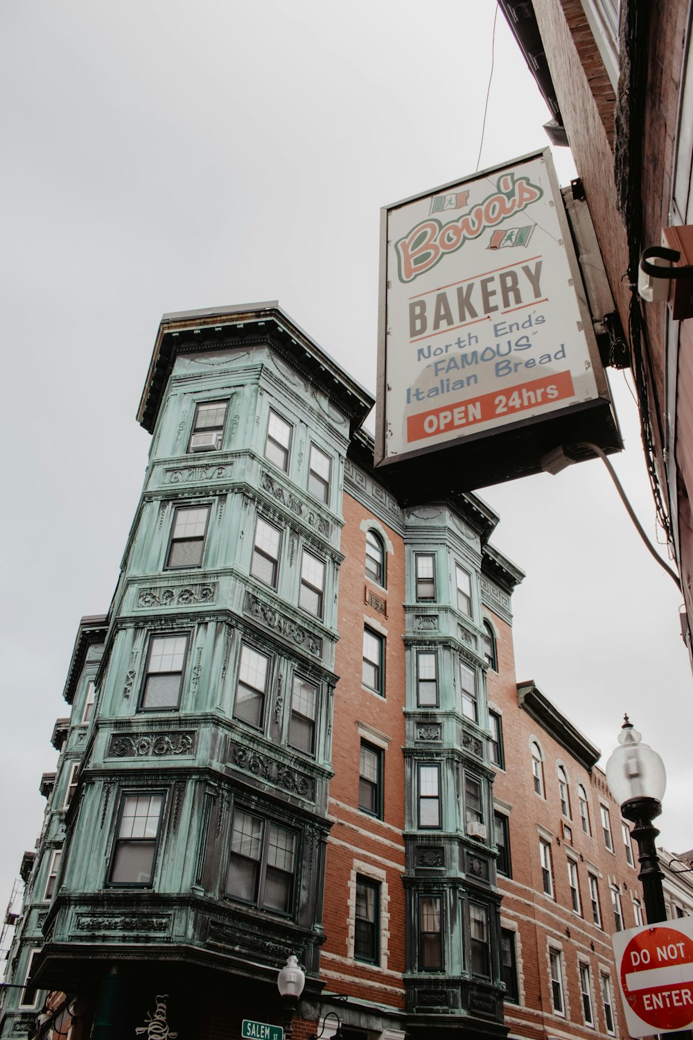 low angle photography of Bova's Bakery signage