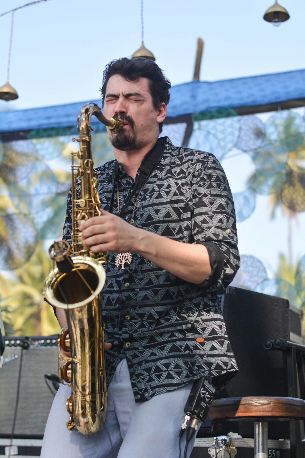 man playing saxophone