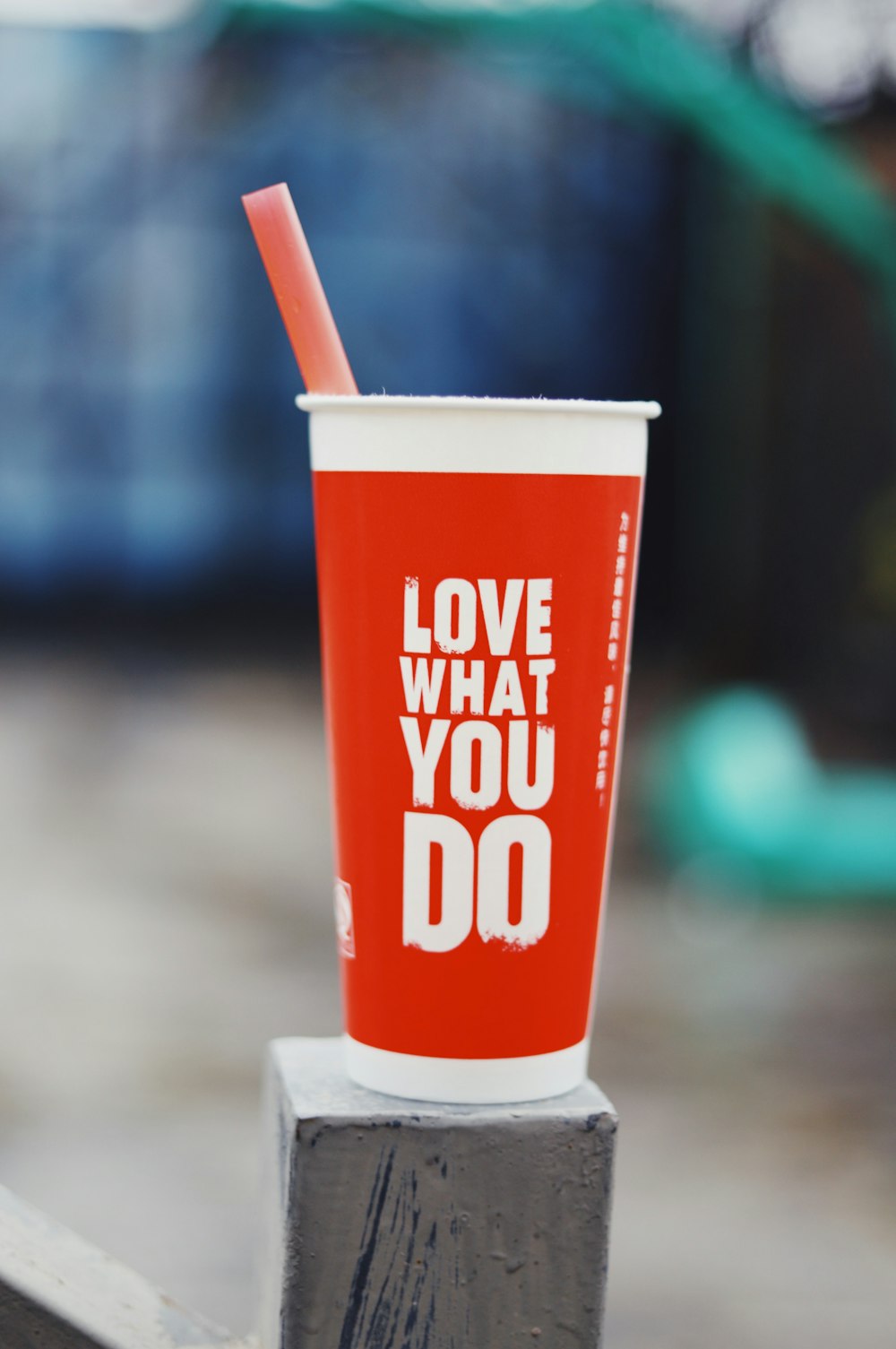 red and white Love What You Do drinking cup