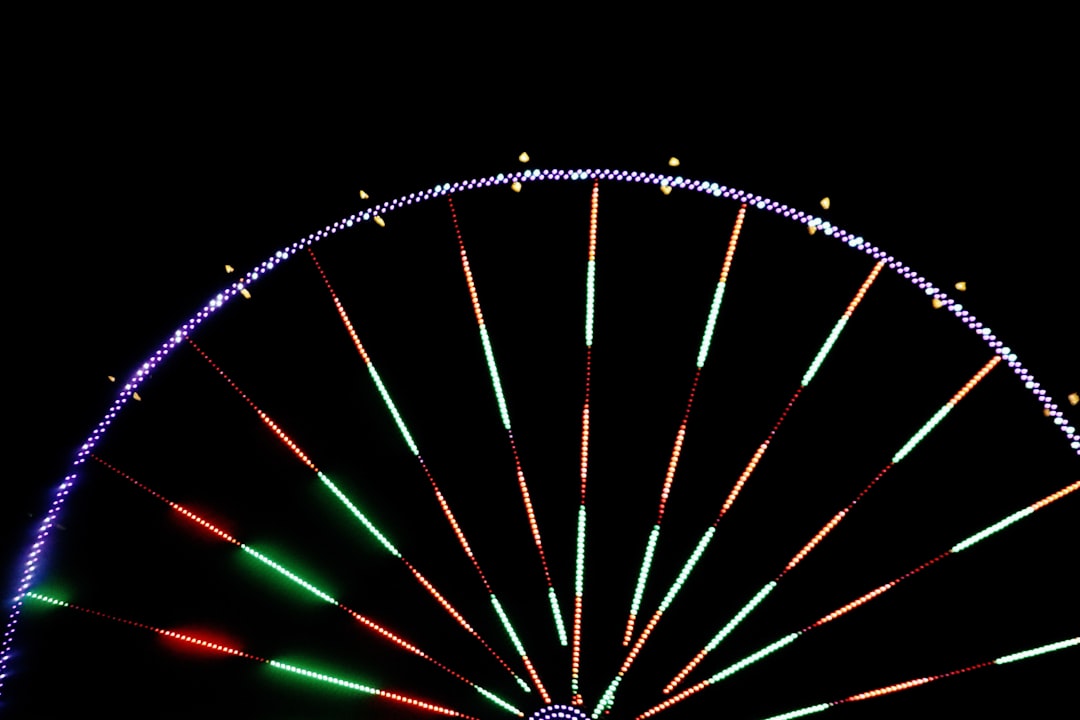 lighted ferris wheel during nighttime