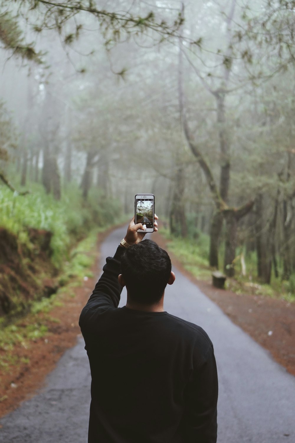 man holding smartphone