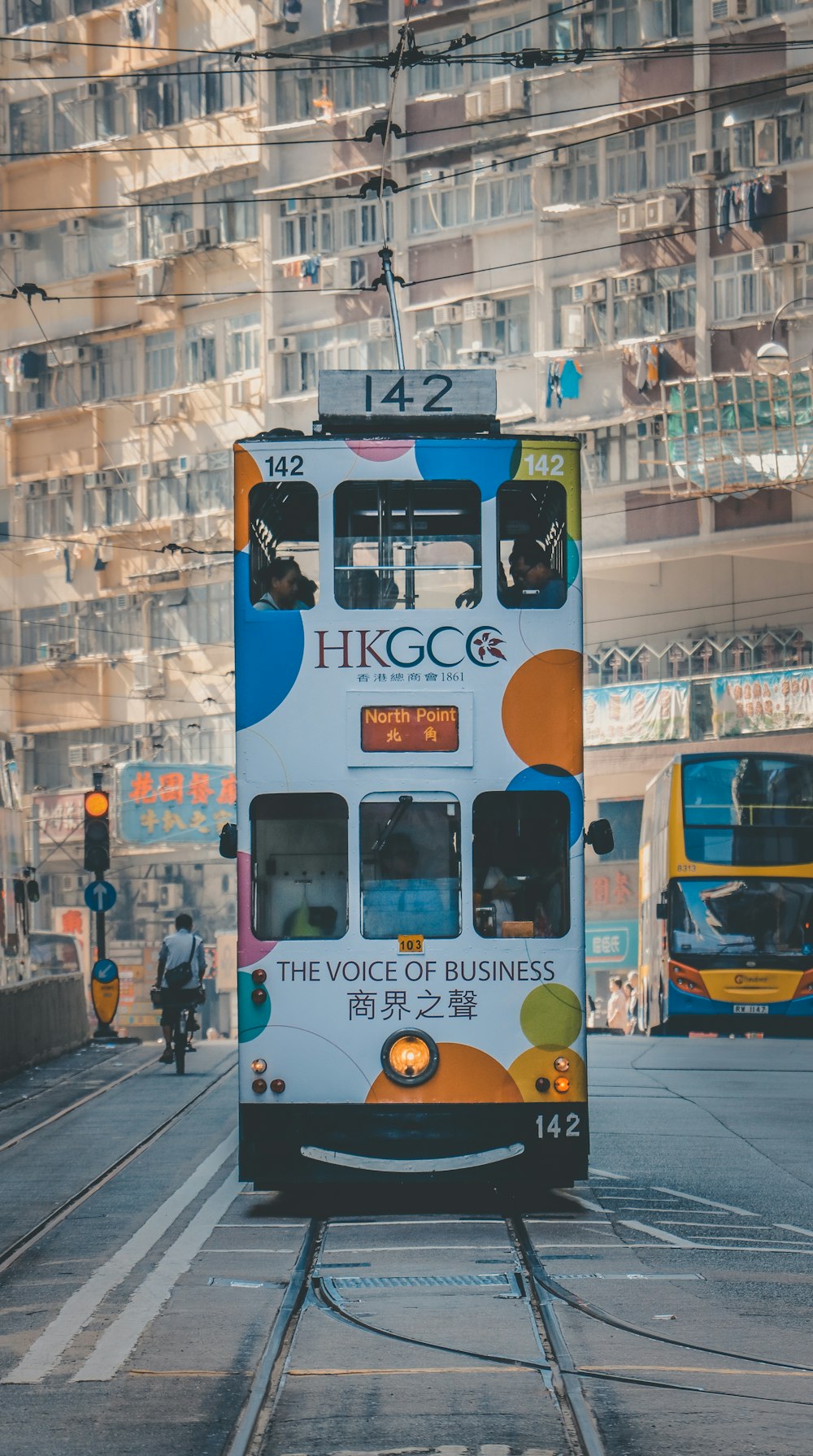 multicolored vehicle on road during daytime