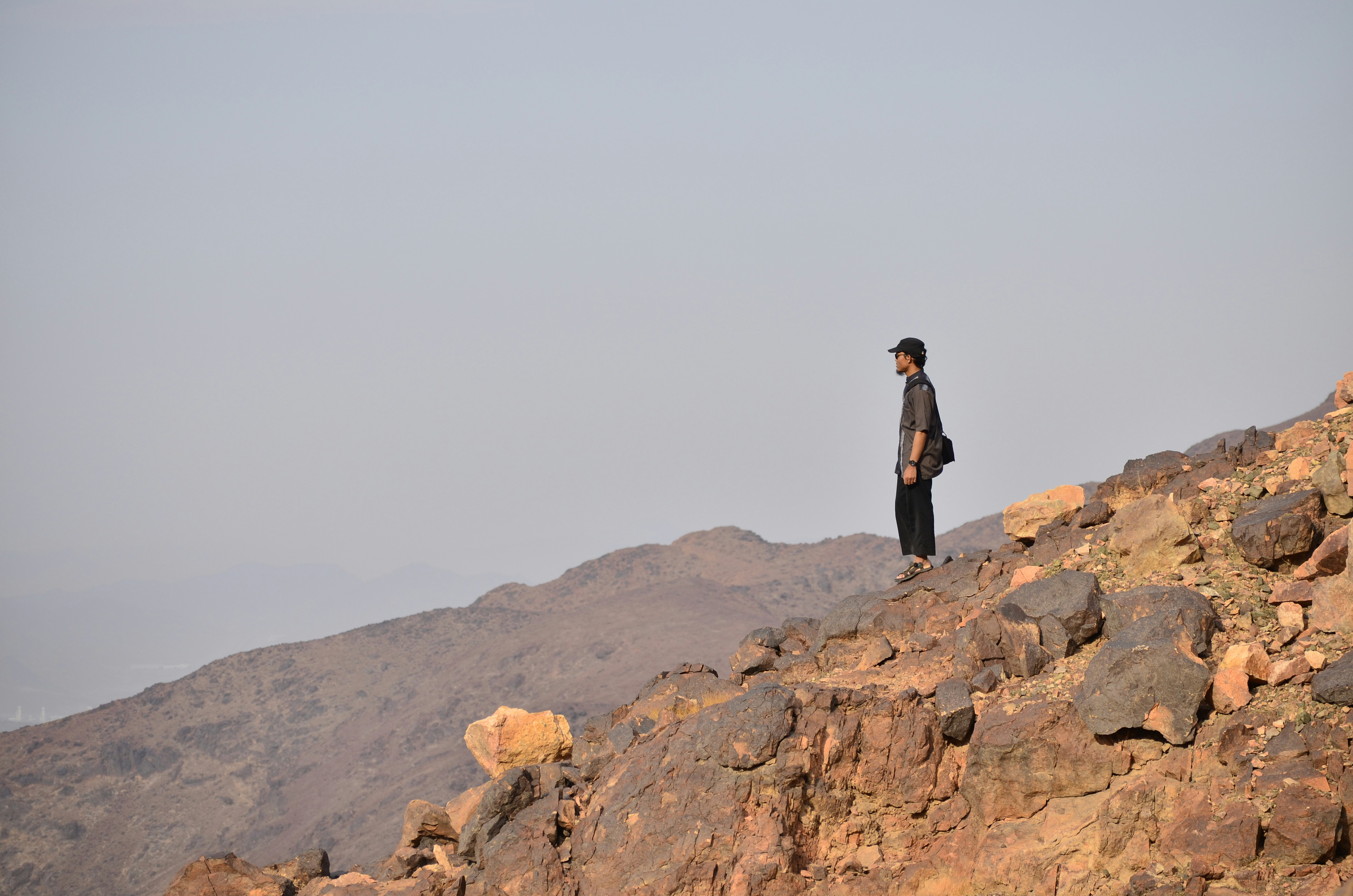 man standing on mountain