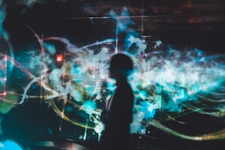 silhouette of person on blue digital wallpaper