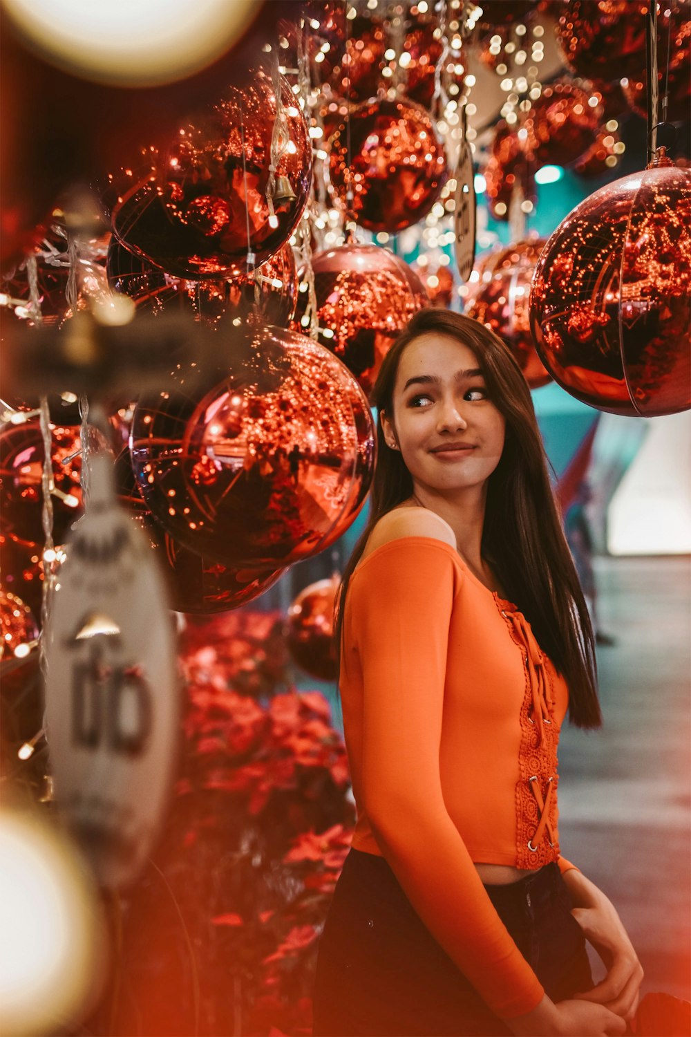 woman wearing orange top