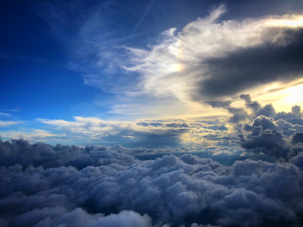 cumulus clouds under blue sky