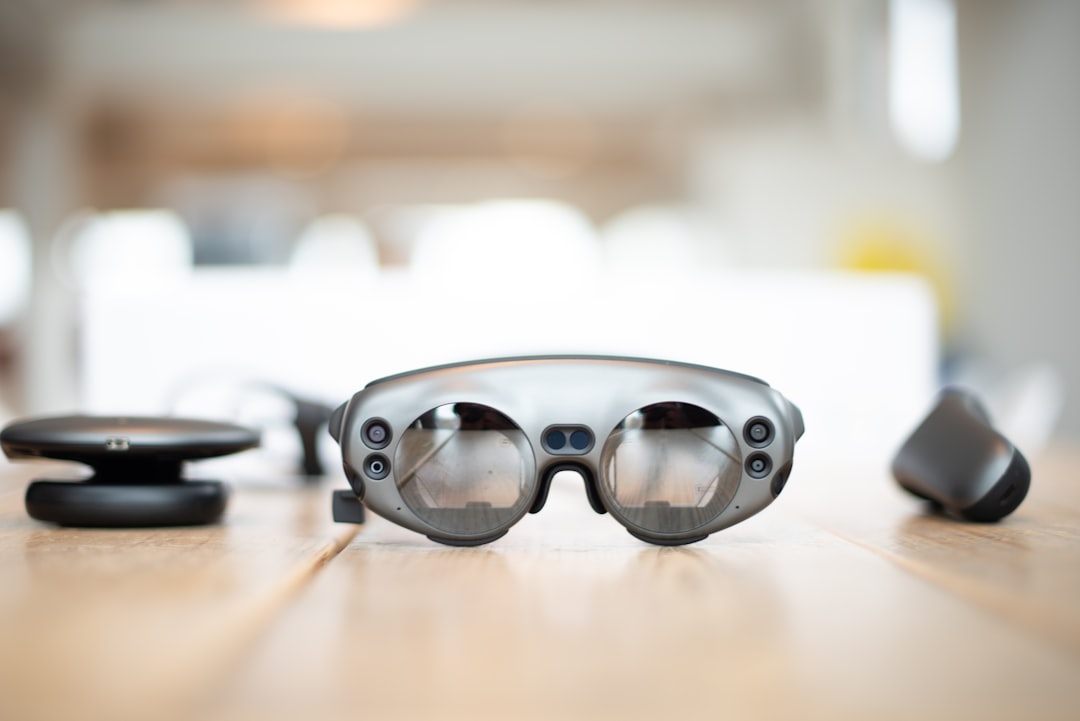 selective focus photography of gray glasses,