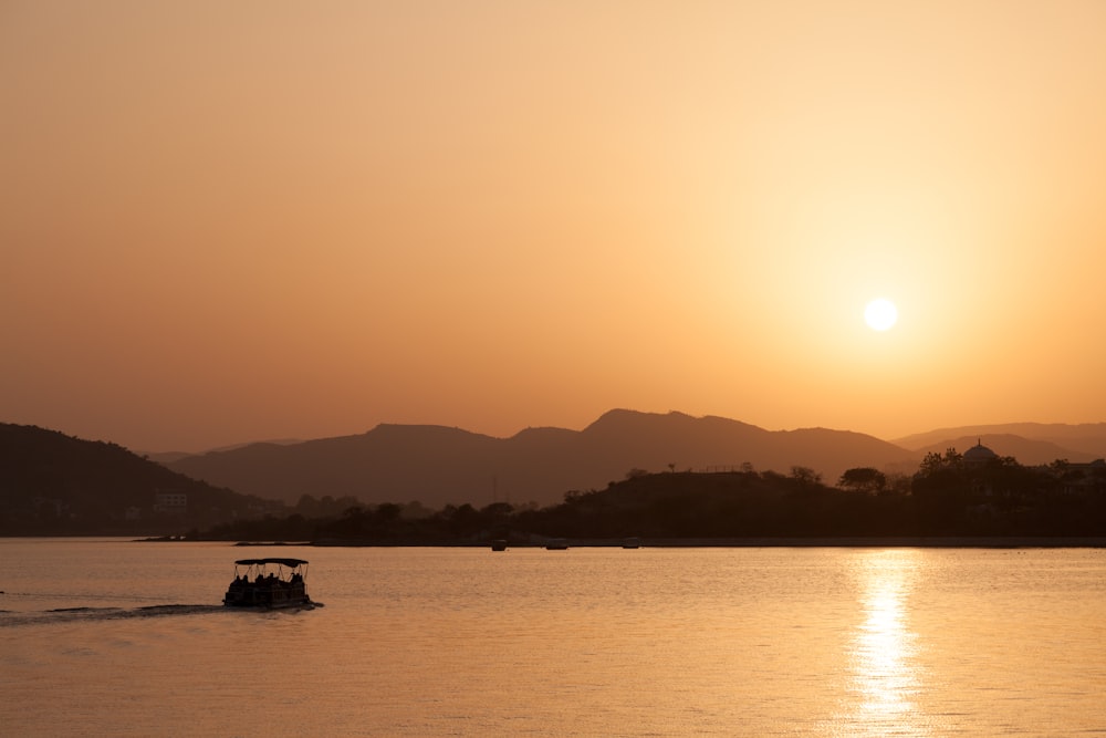 landscape photo of mountains near body of water during daytime