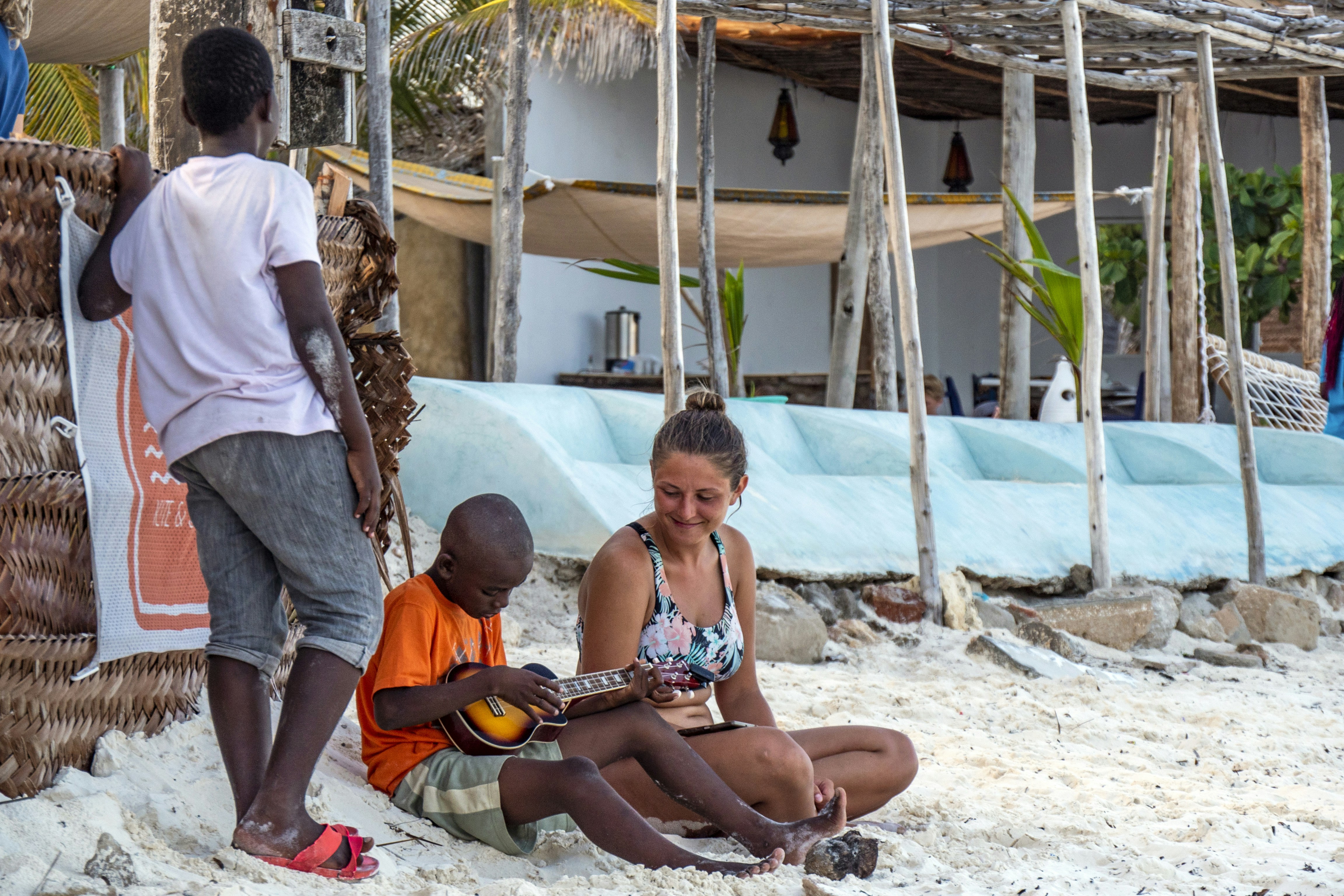 This little fellow was learning how to play some chords on the beach