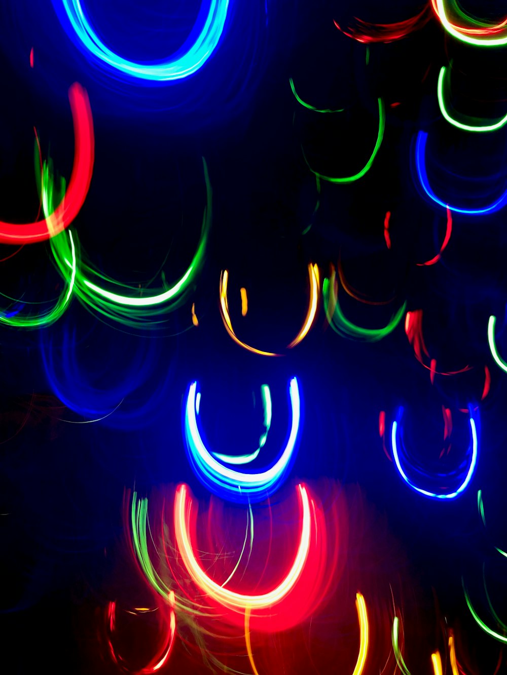 multicolored LED lights hanging during nighttime