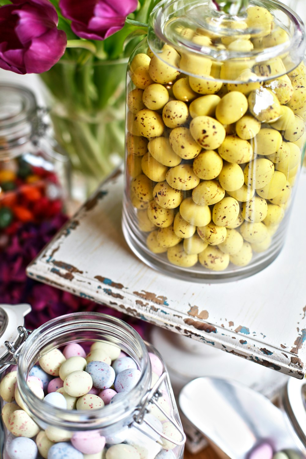 candies inside glass jars