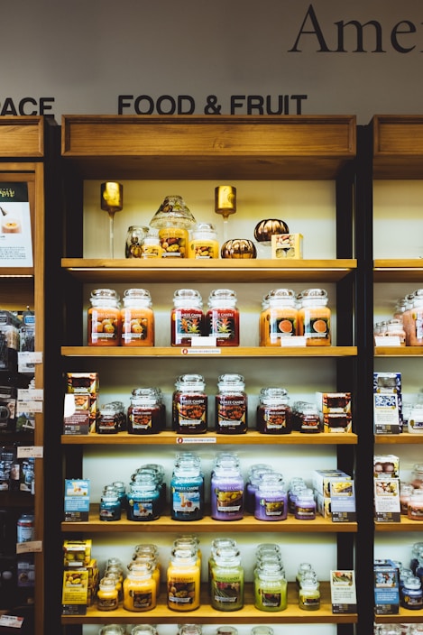 A beautifully arranged display of handmade scented candles.