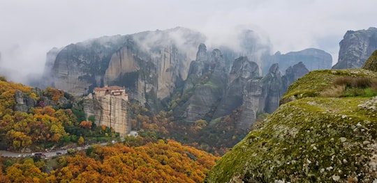 road near the forest and mountains in Meteora Greece