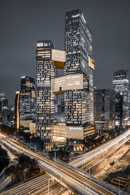 lighted high-rise buildings at nighttime