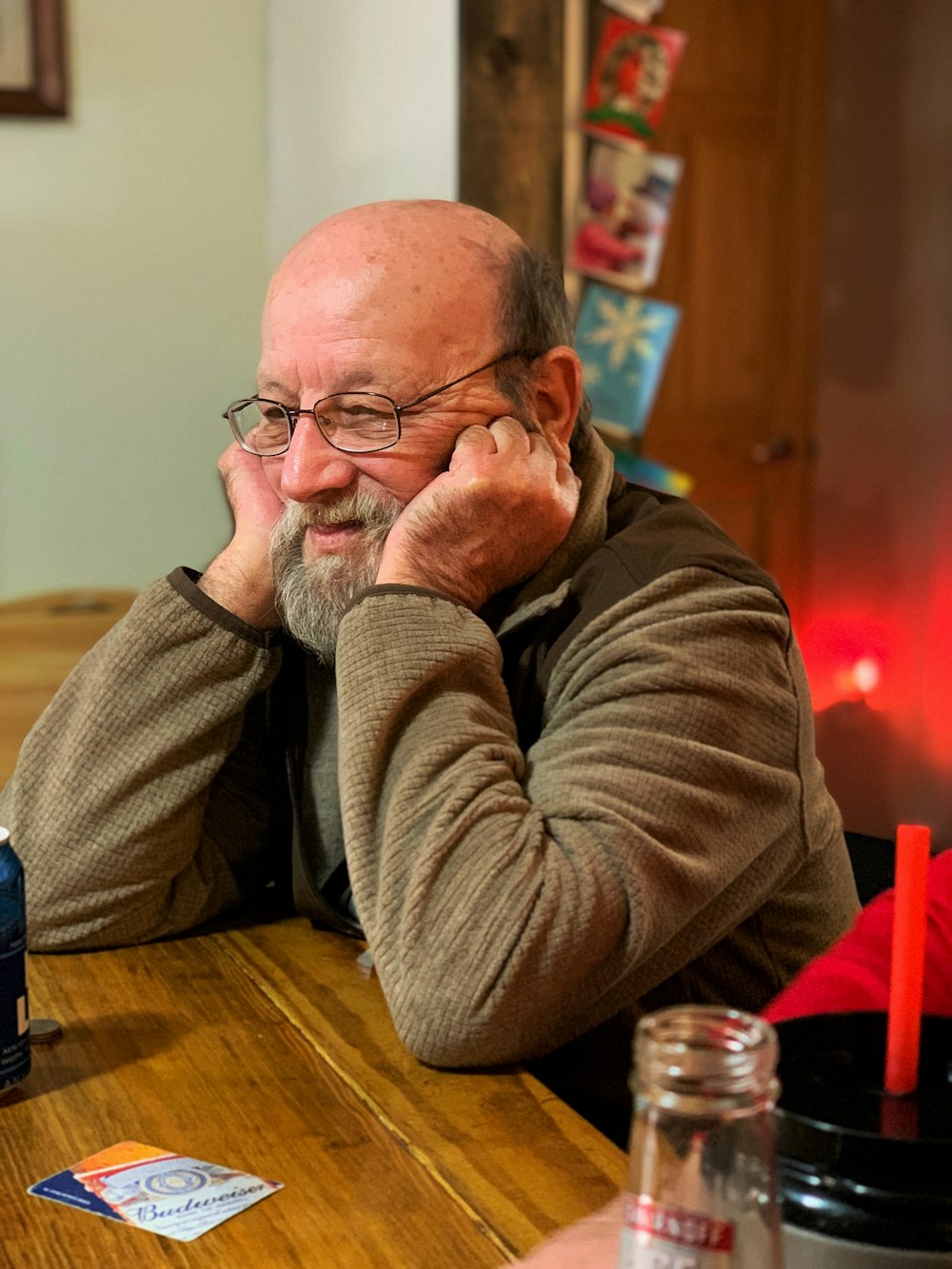 man resting his head on the table