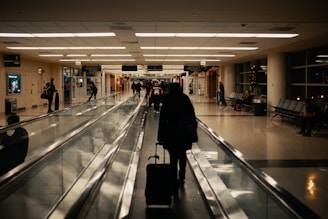 walking man holding luggage