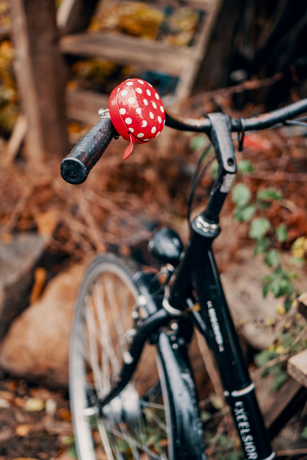 selective focus photography of black bicycle