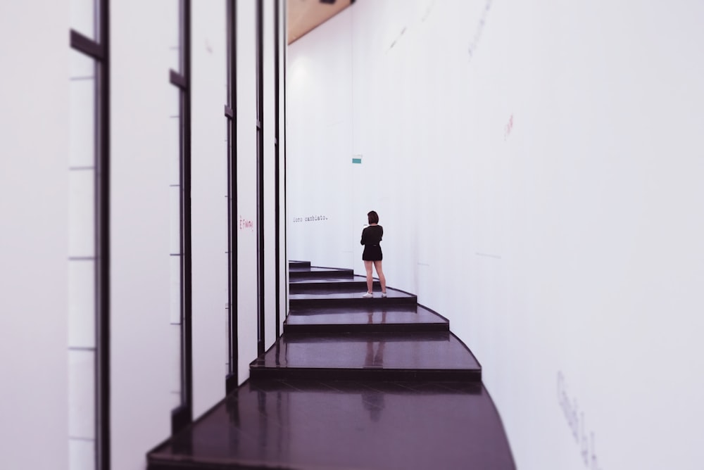 woman standing on stairss