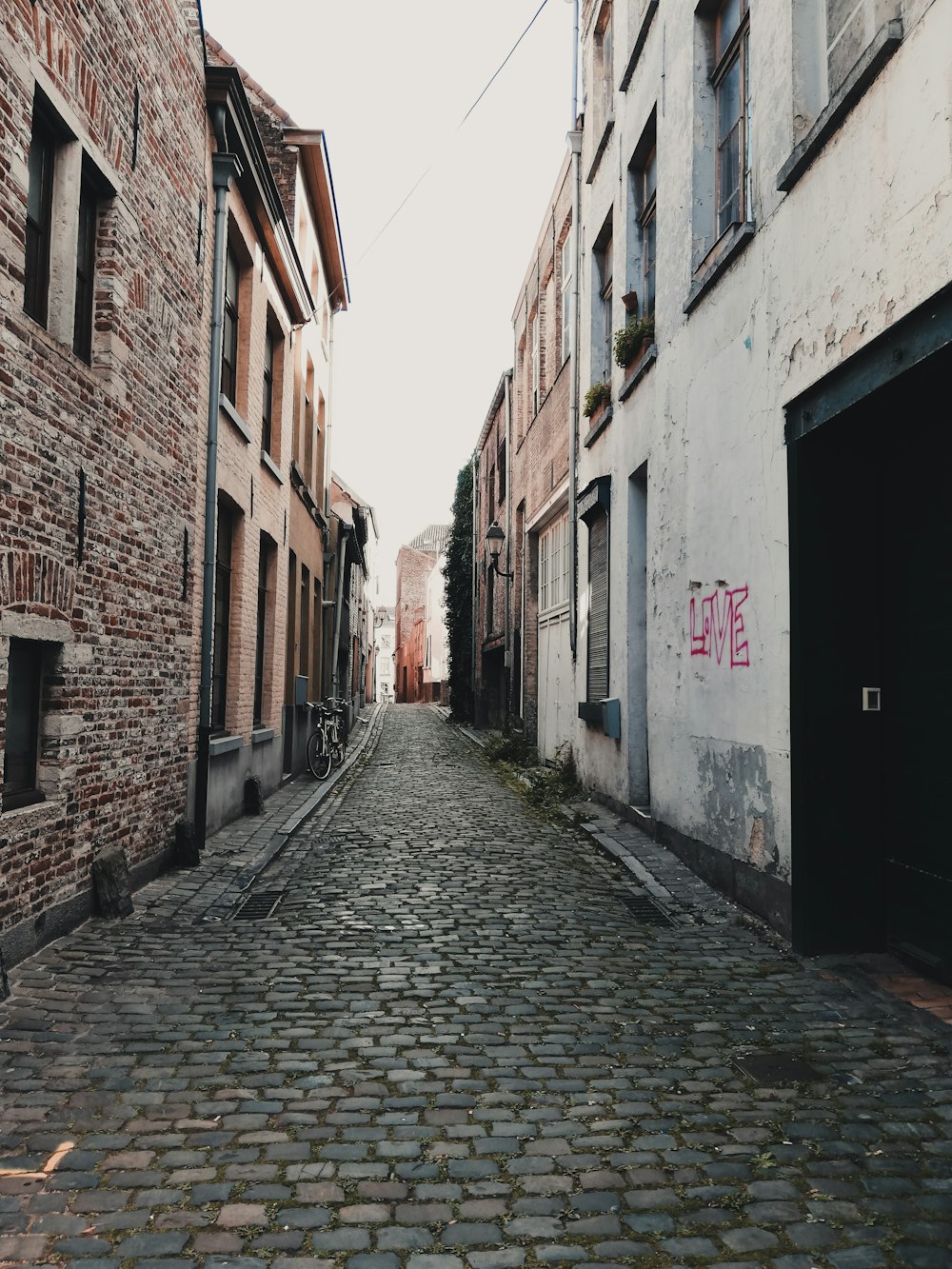 empty road between buildings