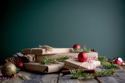 gift boxes with red baubles on top merry christmas google meet background